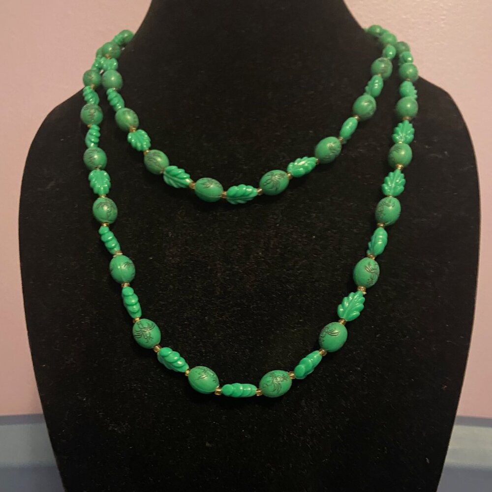 Vintage necklace with green Chinese character beads